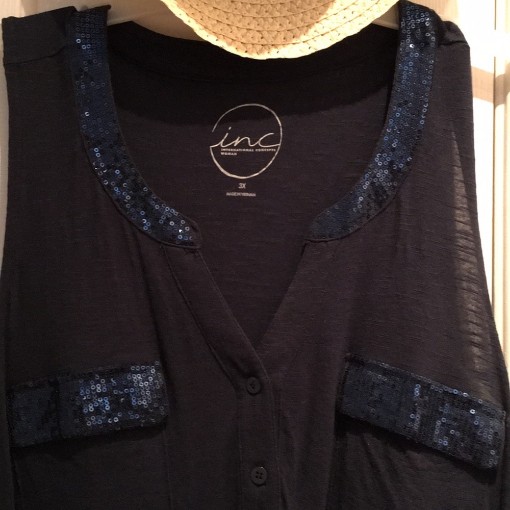 A line top embellished around neck and pockets,